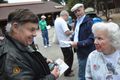 John Ebinger and Anna Wyatt chat with Lary Abramson looking on