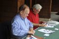 Pete Hanff and Bob Baum prepare the badges